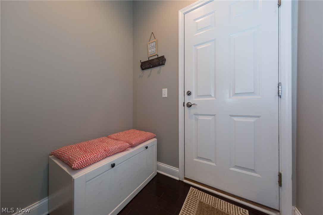 7420 Mystic Ridge Road Chagrin Falls, OH 44023 - Photo 17 of 35 3+ sideload garage enters into the mud room with plenty of space for boots, coats and bookbags.