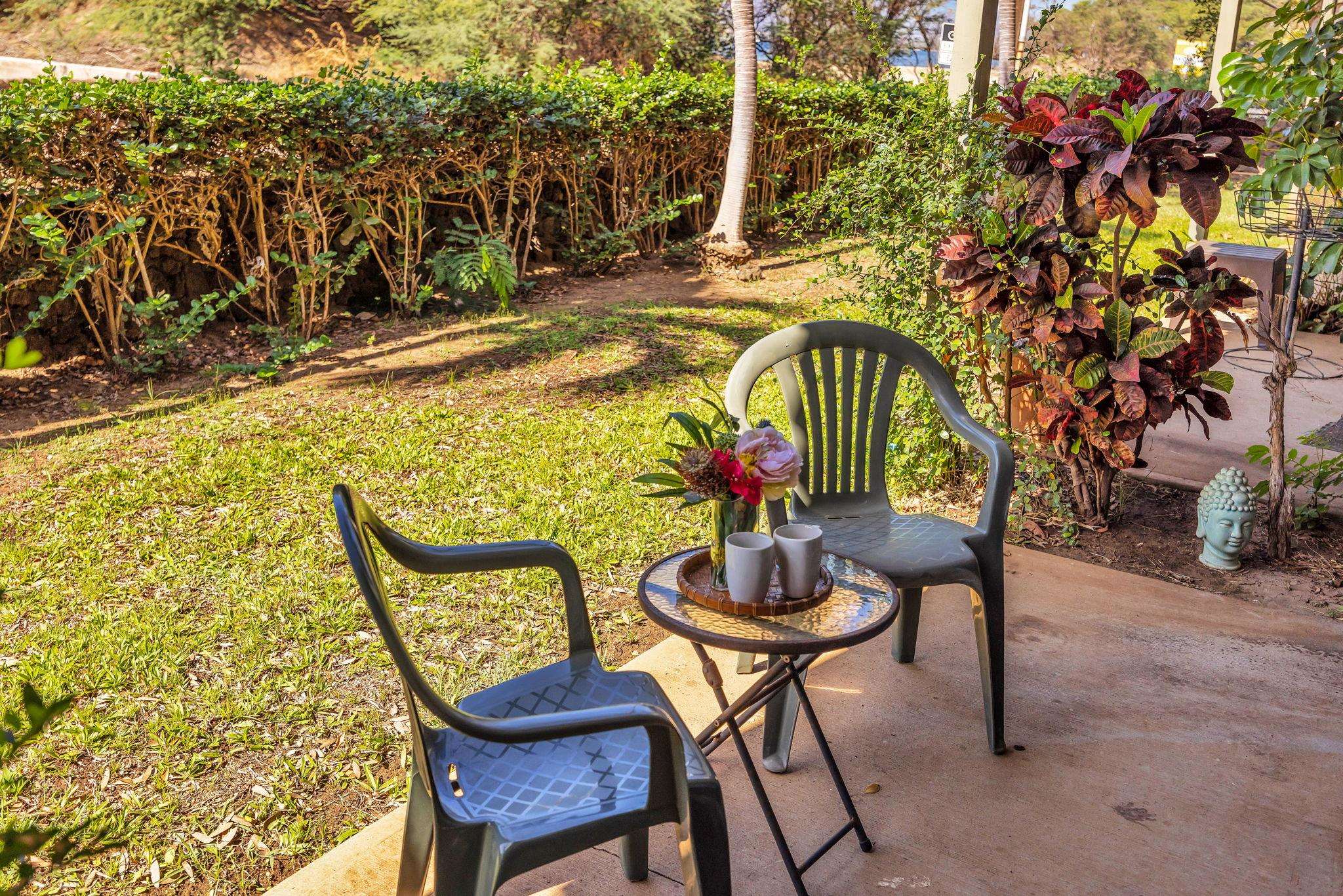 715 South Kihei Road, Unit 107 Kihei, HI 96753 - Photo 15 of 29 a view of a chairs and table in the patio