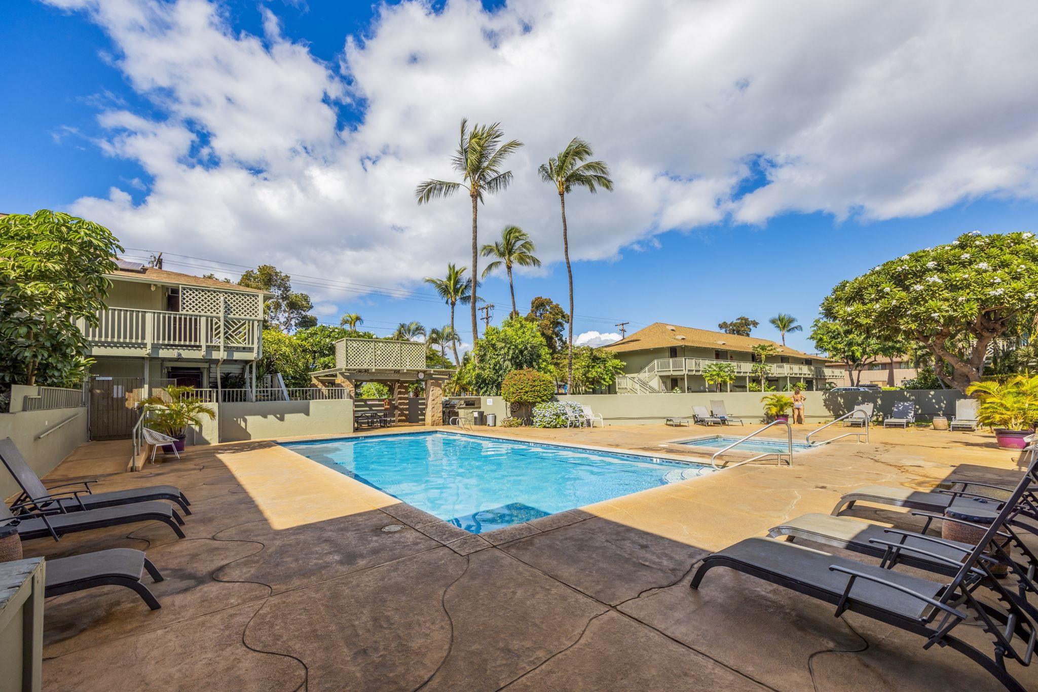 715 South Kihei Road, Unit 107 Kihei, HI 96753 - Photo 20 of 29 a view of a swimming pool with an outdoor seating