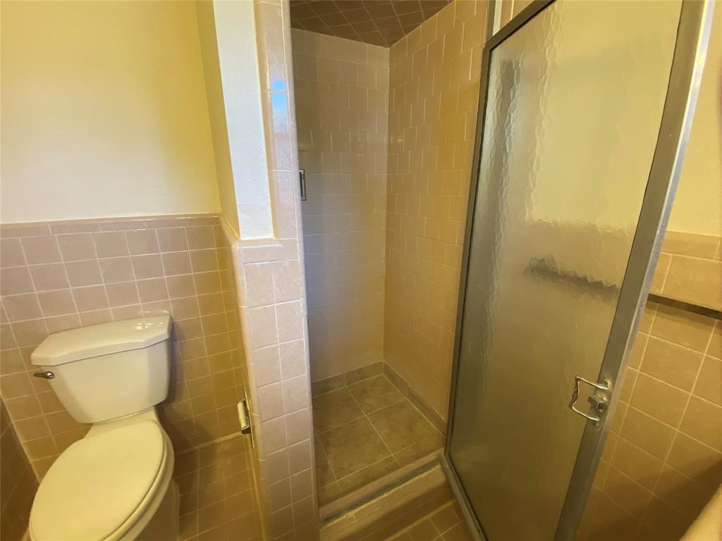 4402 Cheena Drive Houston, TX 77096 - Photo 23 of 35 a bathroom with sink toilet and shower