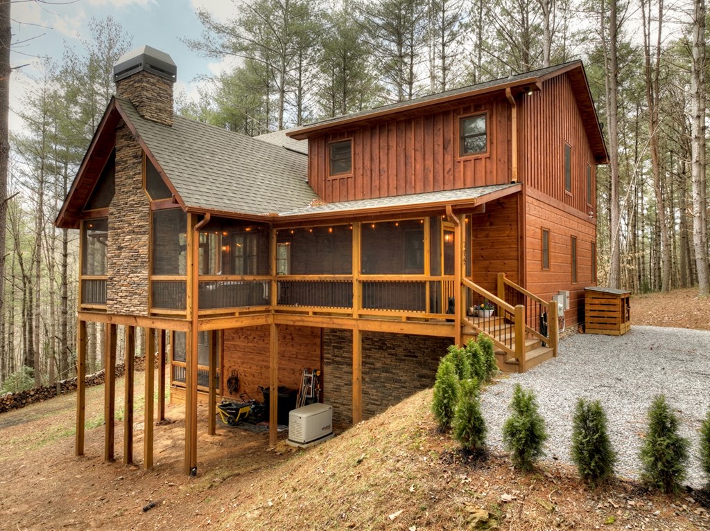 705 George Curtis Road Blue Ridge, GA 30513 - Photo 45 of 49 a view of a house with a patio
