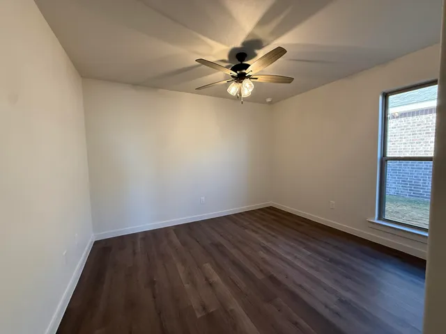 a view of a backyard of the house