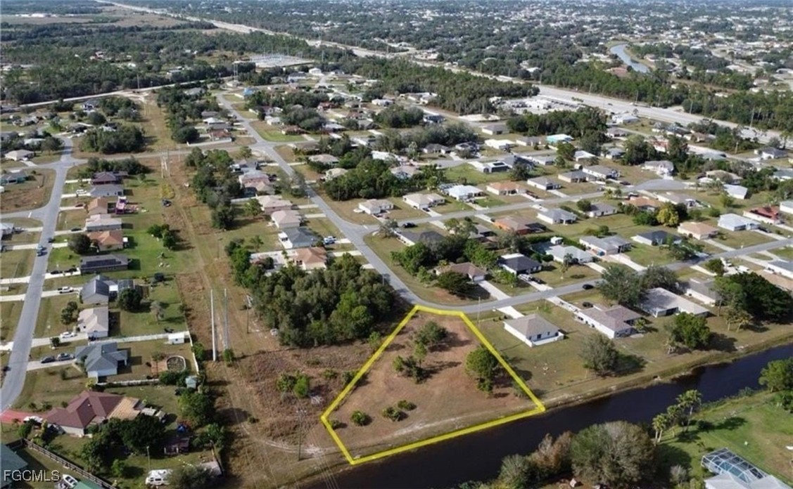 145 Zenith Circle Fort Myers, FL 33913 - Photo 4 of 9 an aerial view of residential houses with outdoor space