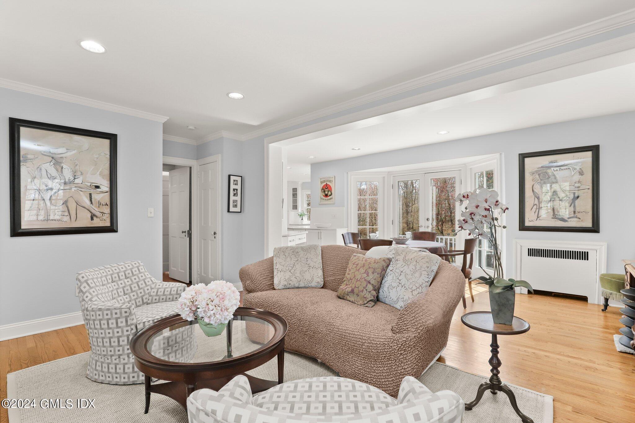 174 Cat Rock Road Cos Cob, CT 06807 - Photo 18 of 45 a living room with furniture and wooden floor