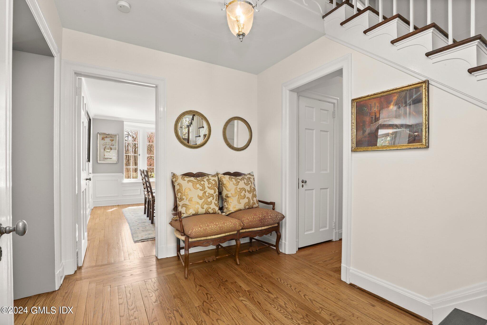 174 Cat Rock Road Cos Cob, CT 06807 - Photo 5 of 45 a living room with furniture and a wooden floor