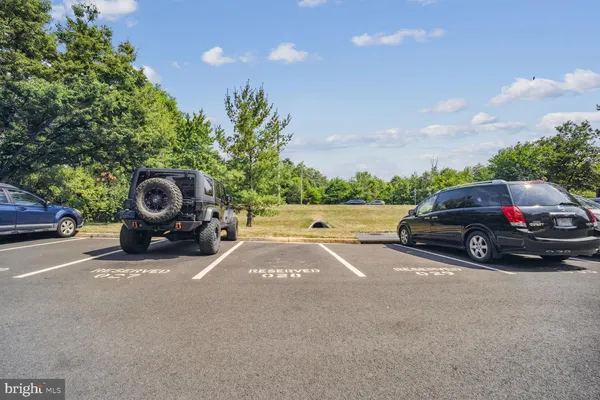 a view of a cars parked in a parking lot