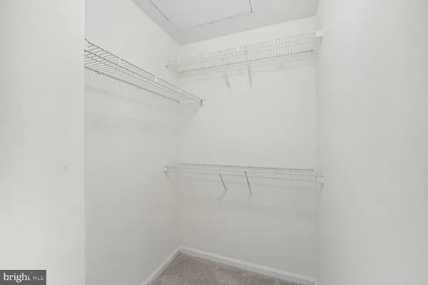 a view of a room with racks on the wall