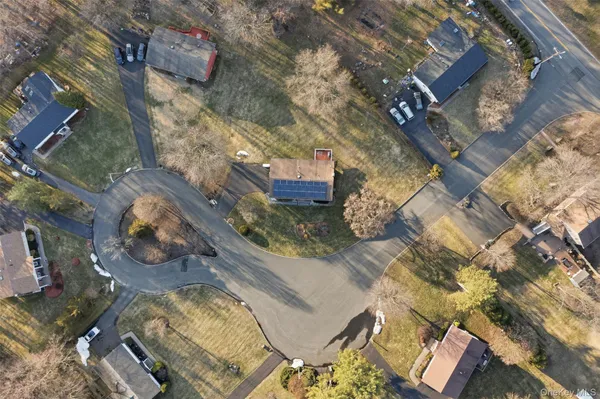 an aerial view of residential house with outdoor space