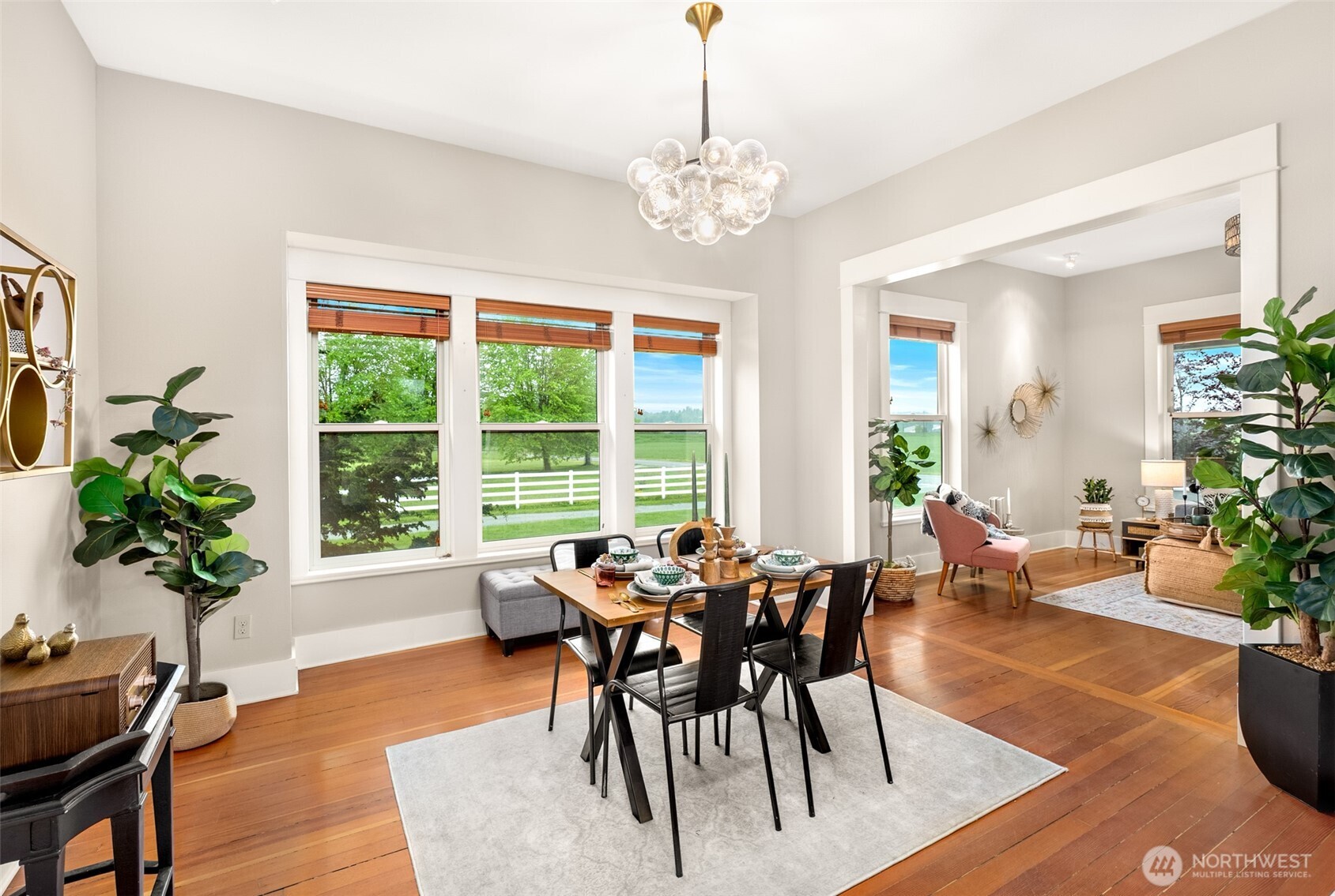 2304 Norman Road Stanwood, WA 98292 - Photo 5 of 39 a view of a dining room with furniture window and wooden floor