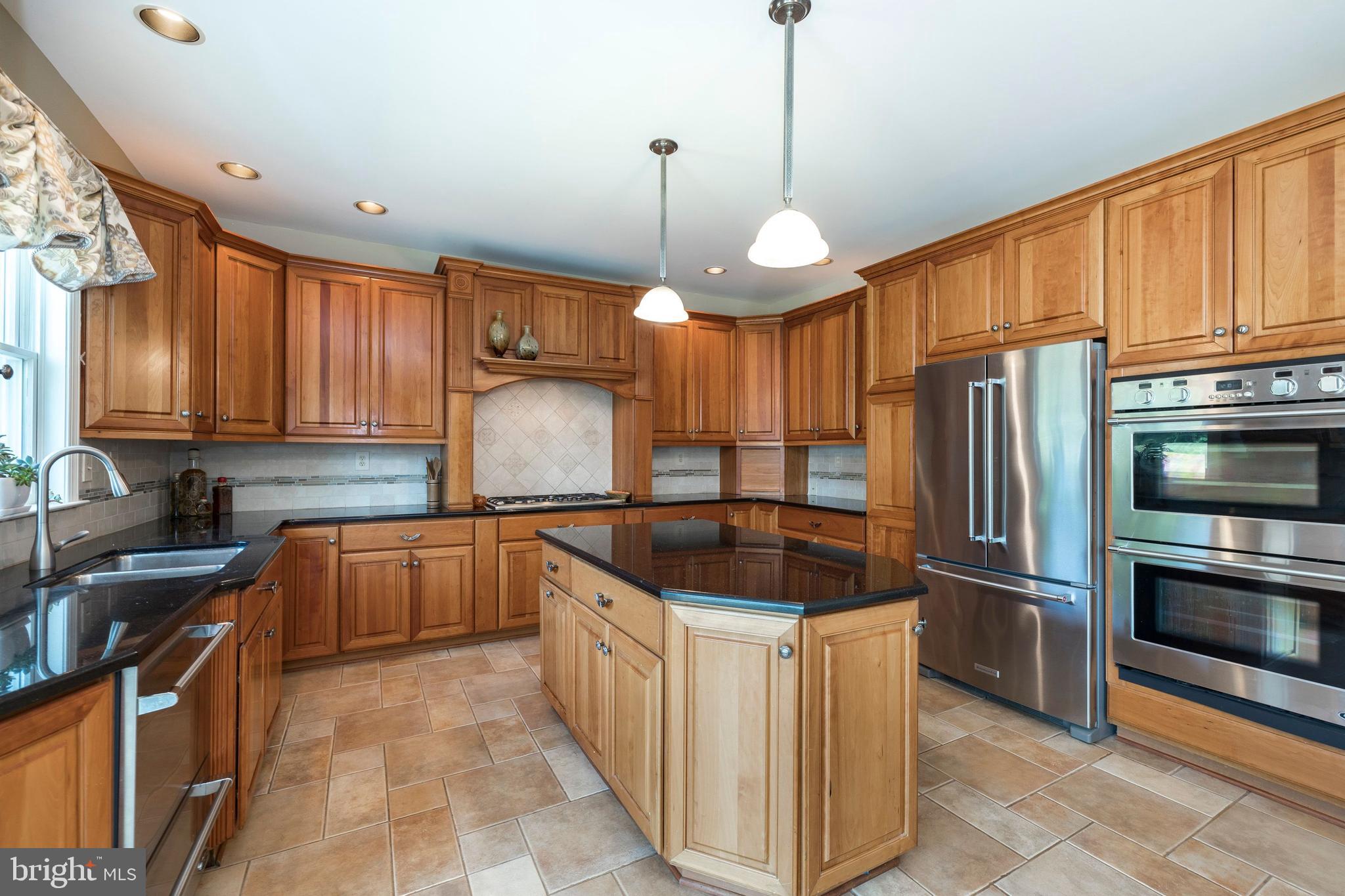 1131 Braefield Road Chester Springs, PA 19425 - Photo 14 of 38 Gas Cooktop and Fisher and Paykel Double Oven