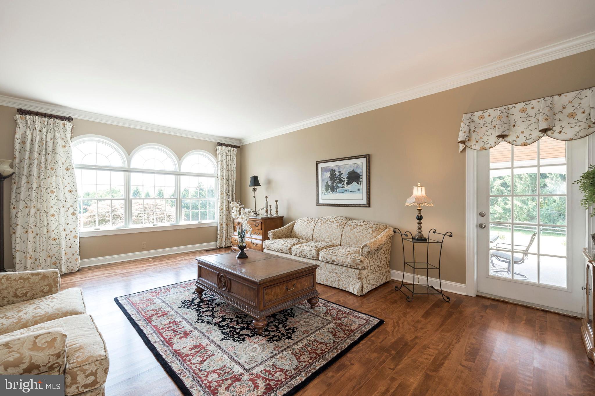 1131 Braefield Road Chester Springs, PA 19425 - Photo 7 of 38 Formal Living Room with Crown Molding