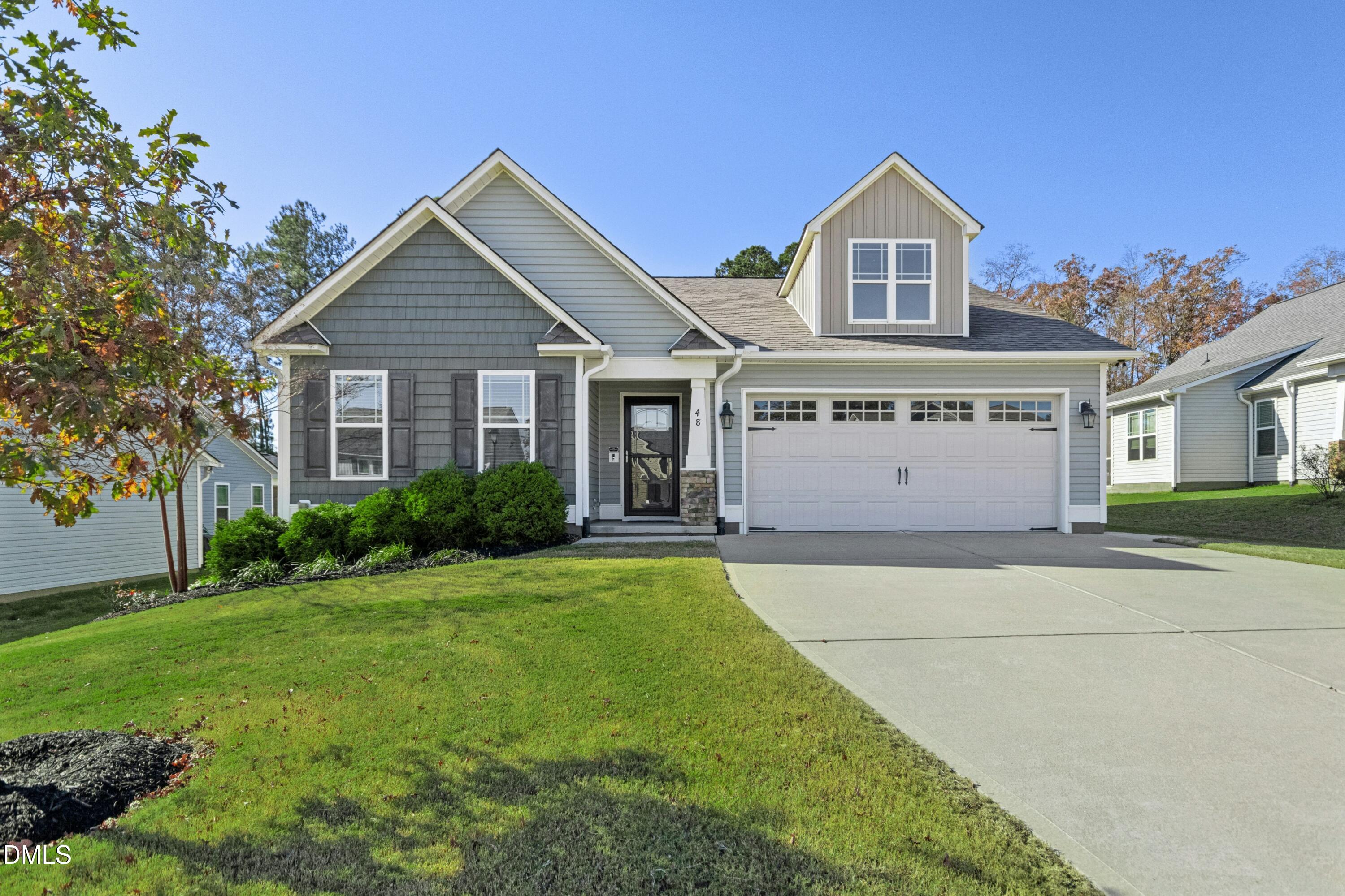 48 Mountain View Drive Garner, NC 27529 - Photo 1 of 29 a front view of a house with a yard