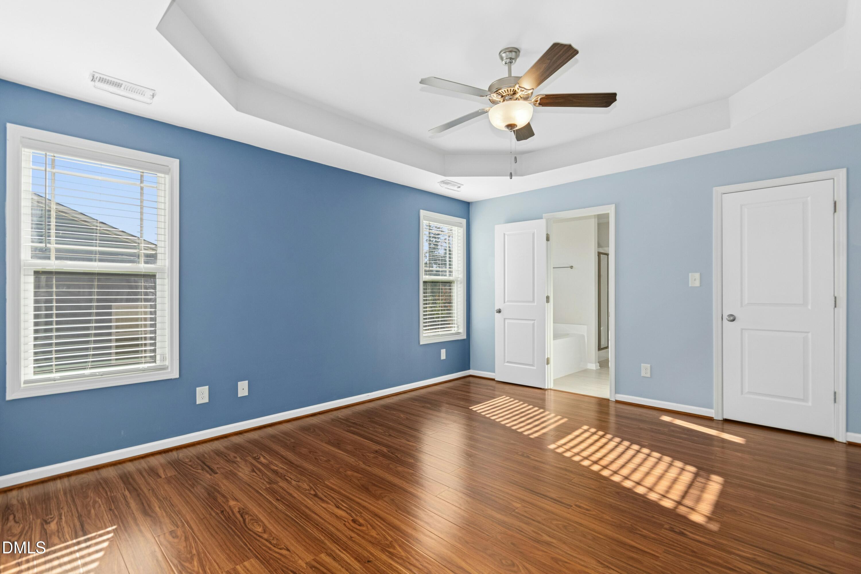 48 Mountain View Drive Garner, NC 27529 - Photo 11 of 29 a view of an empty room with wooden floor and a window