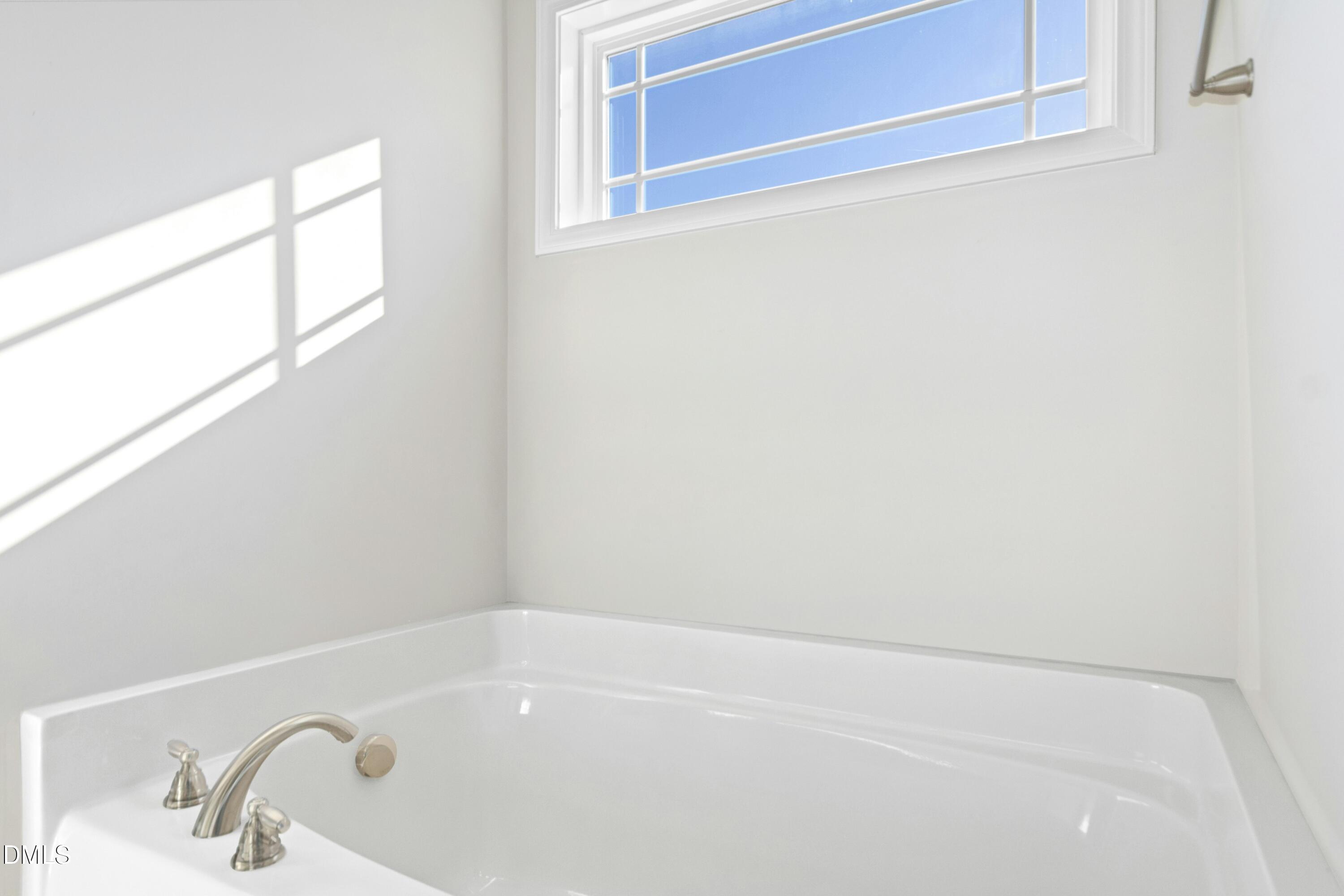 48 Mountain View Drive Garner, NC 27529 - Photo 15 of 29 a bathroom with a bathtub