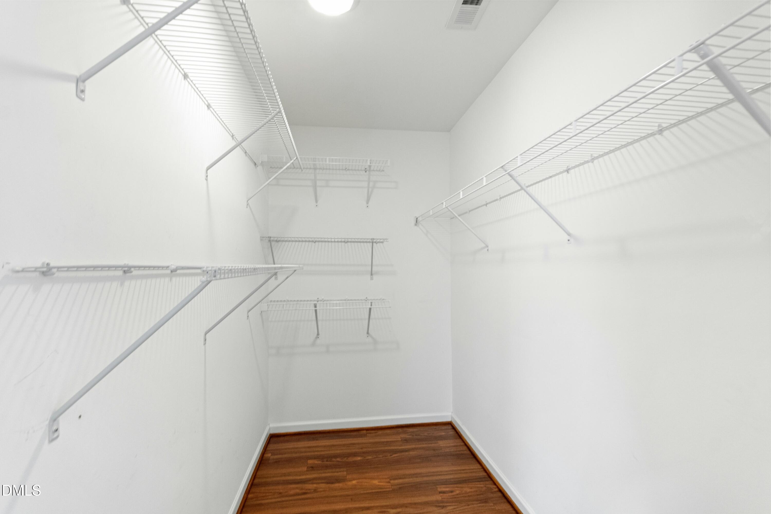 48 Mountain View Drive Garner, NC 27529 - Photo 17 of 29 a view of a room with racks on the wall