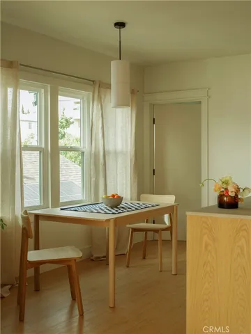 a room with a table and chairs