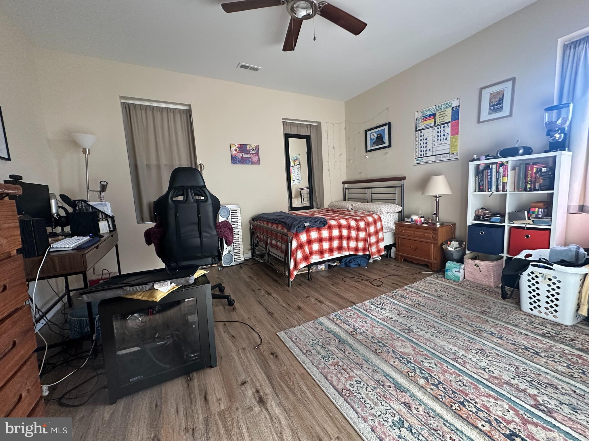 1648 South 16th Street, Unit 2 Philadelphia, PA 19145 - Photo 6 of 10 a bedroom with furniture and a rug