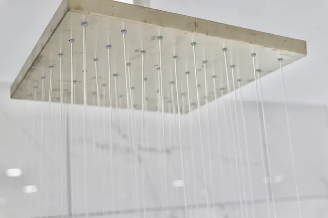 a bath tub sitting next to a window