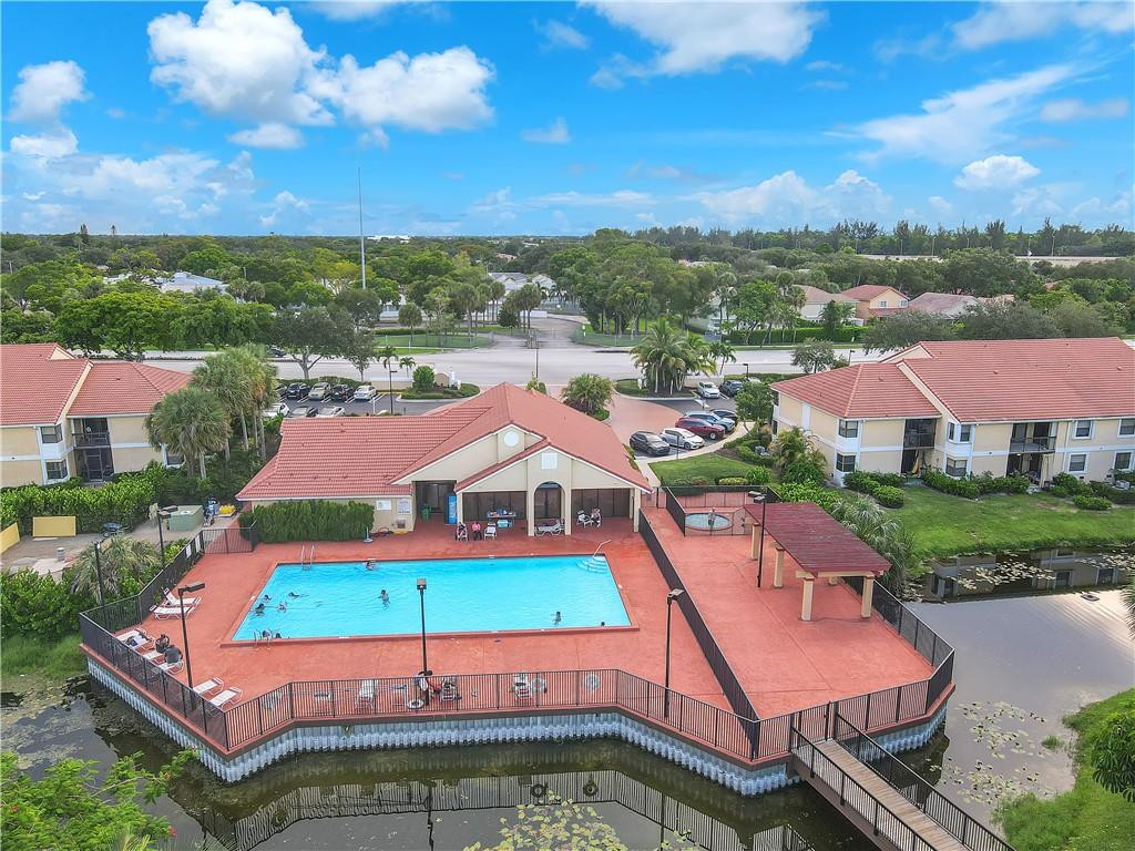 5681 Riverside Drive, Unit 101A6 Coral Springs, FL 33067 - Photo 25 of 25 an outdoor space with patio