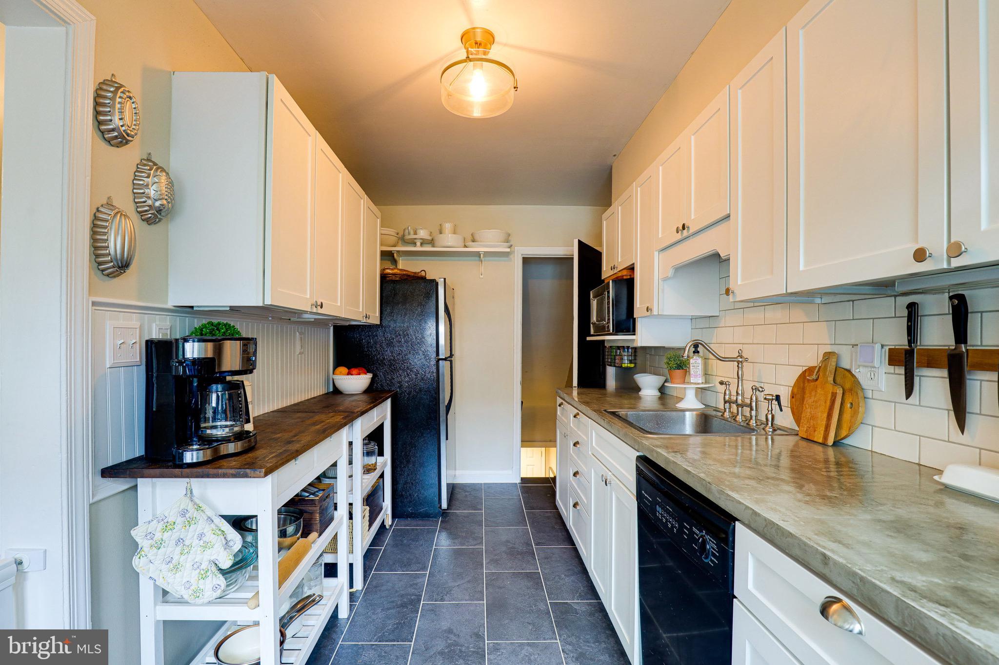 205 Brandon Road Baltimore, MD 21212 - Photo 15 of 36 Updated galley kitchen provides plenty of storage!