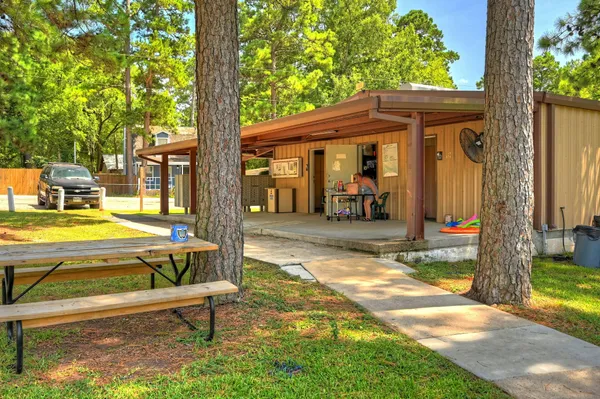 a view of outdoor space with trees all around