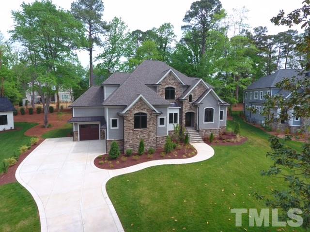3208 Cobblestone Court Raleigh, NC 27607 - Photo 1 of 25 a aerial view of a house with garden