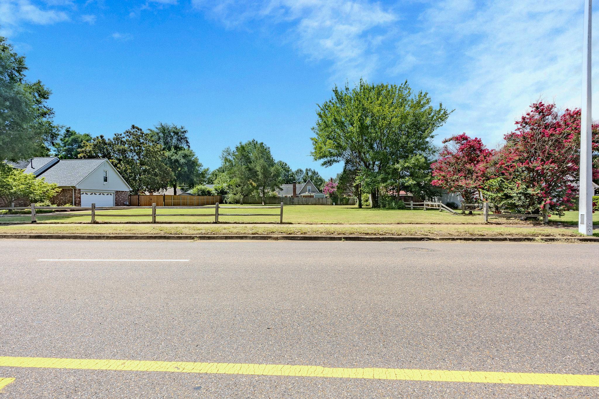 8697 Walnut Grove Road Memphis, TN 38018 - Photo 5 of 11 View of asphalt street with sidewalks and curbs