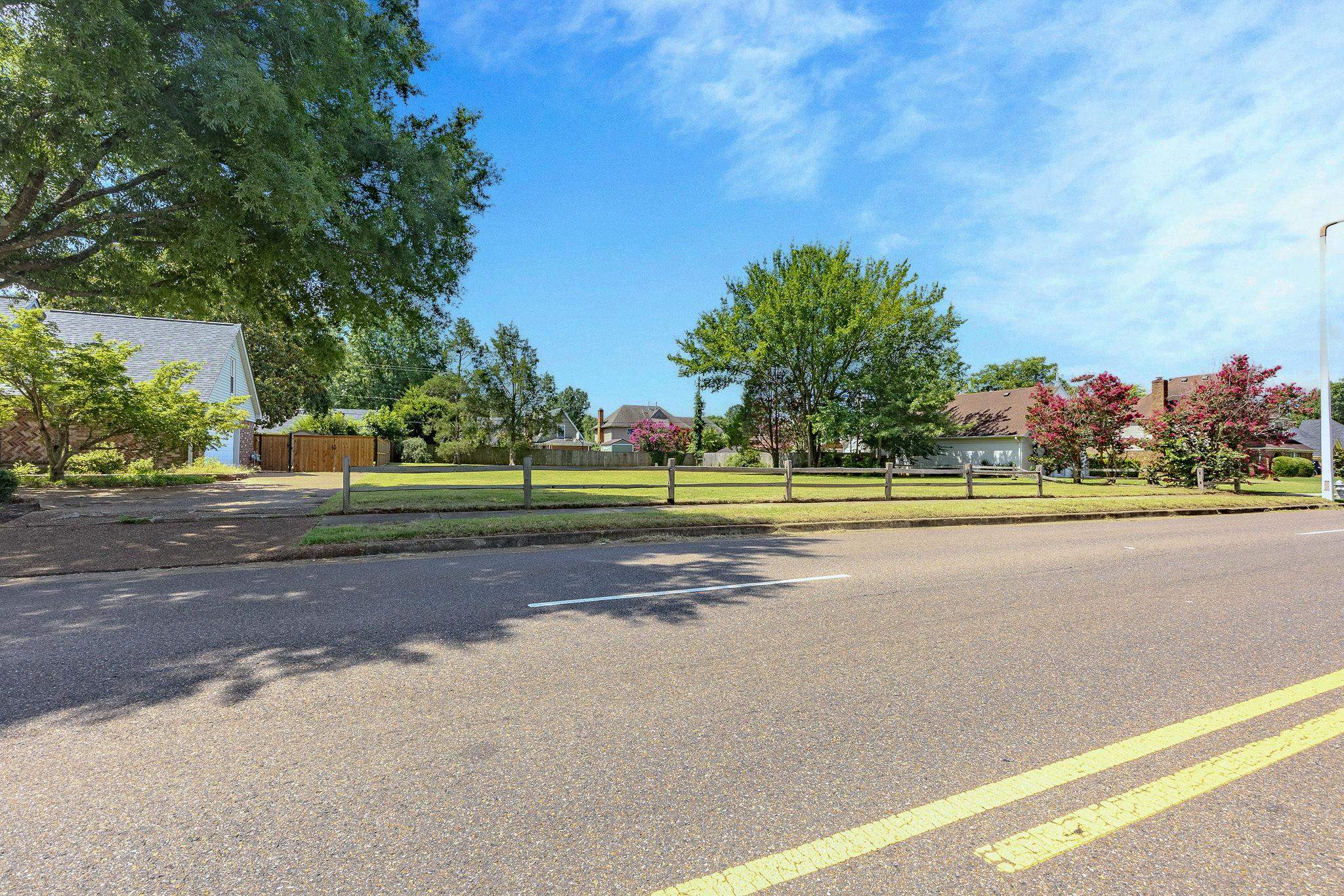 8697 Walnut Grove Road Memphis, TN 38018 - Photo 7 of 11 View of asphalt road with sidewalks and curbs