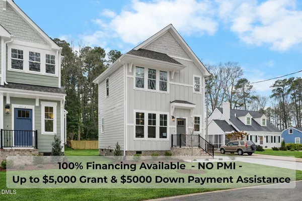 a front view of a building with garden