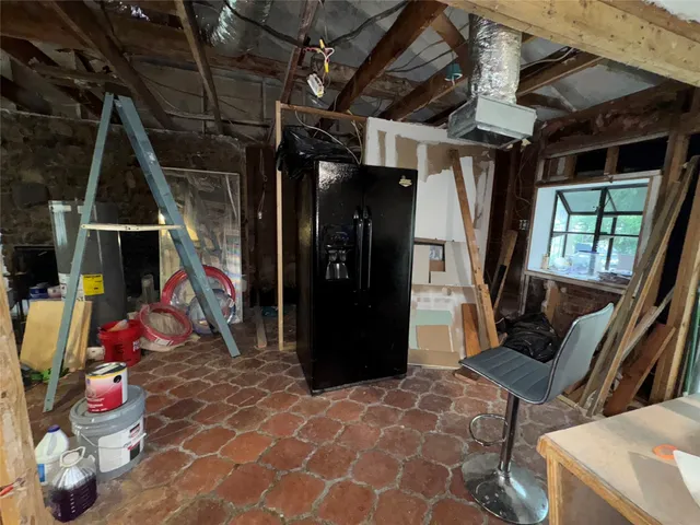 a view of a storage room with furniture