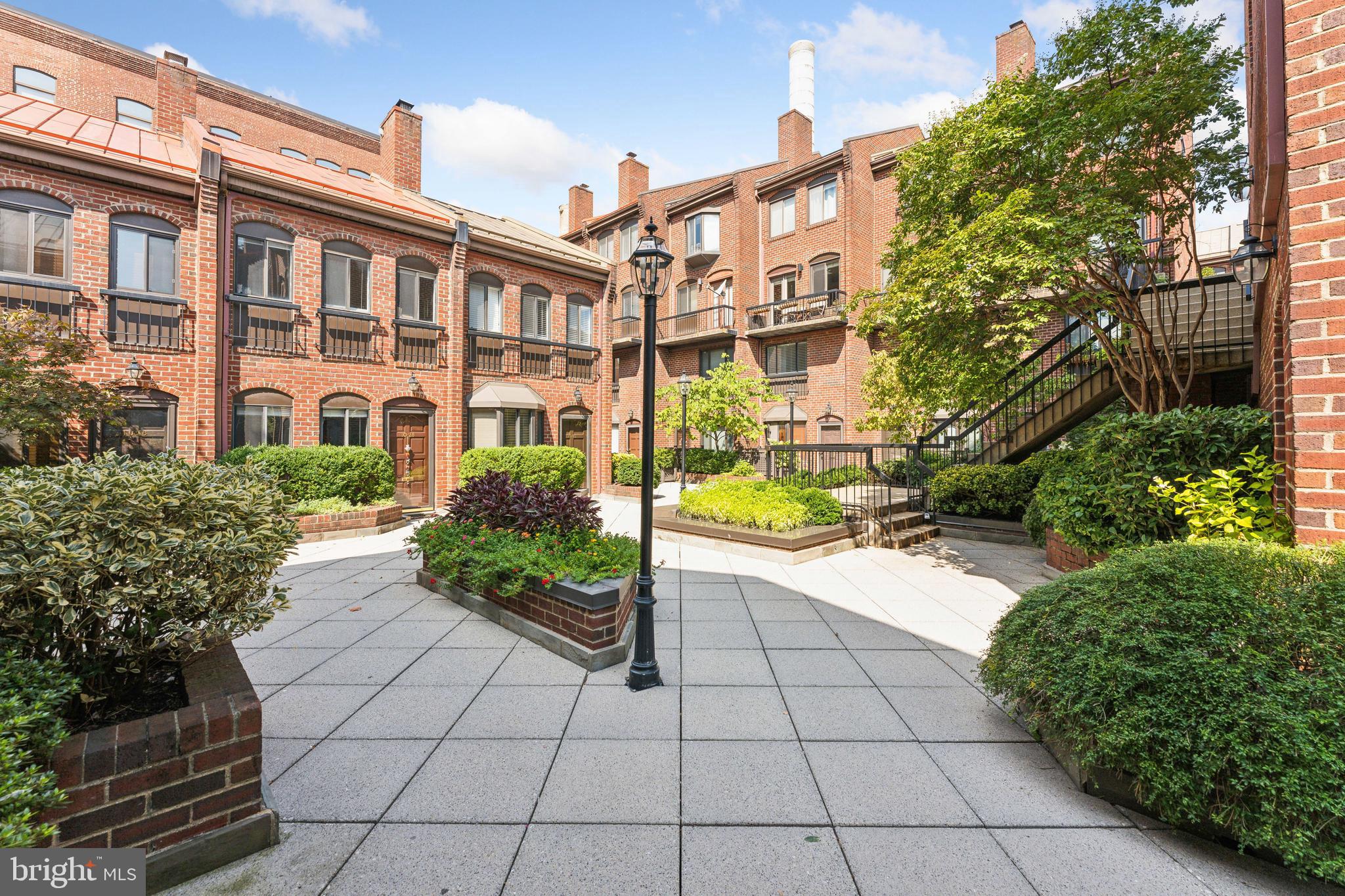 1066 Paper Mill Court, Unit 1066 Washington, DC 20007 - Photo 15 of 25 a view of a building with garden
