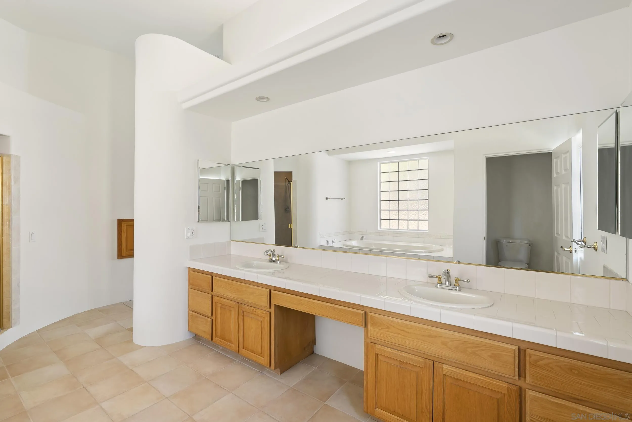 28328 Kettering Lane Escondido, CA 92026 - Photo 19 of 47 a bathroom with a double vanity sink mirror and