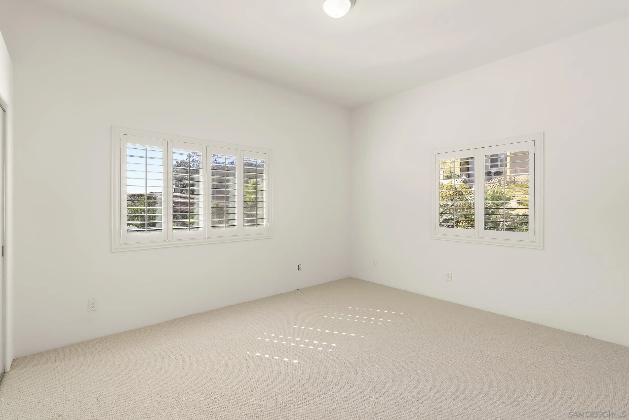 28328 Kettering Lane Escondido, CA 92026 - Photo 26 of 47 an empty room with windows