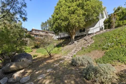 a view of backyard with green space