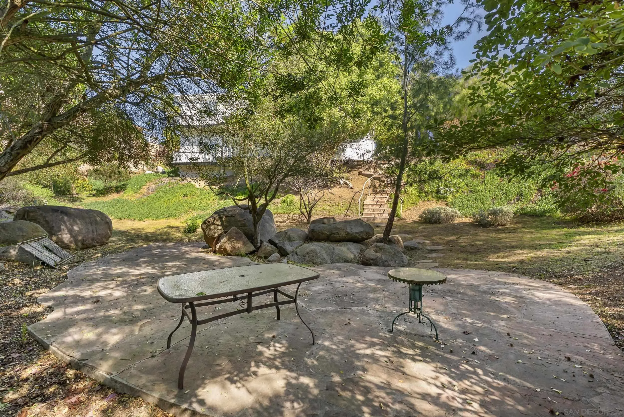 28328 Kettering Lane Escondido, CA 92026 - Photo 36 of 47 a view of a backyard with plants and outdoor seating