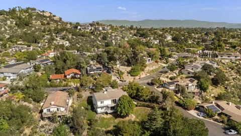 an aerial view of a city with lots of residential buildings