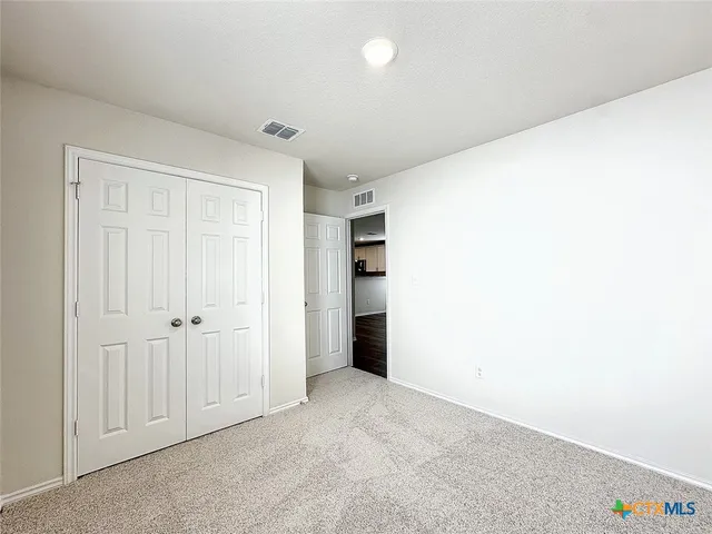 an empty room with an entryway