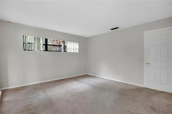 a view of an empty room with window