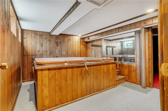 a view of bathroom with a large window