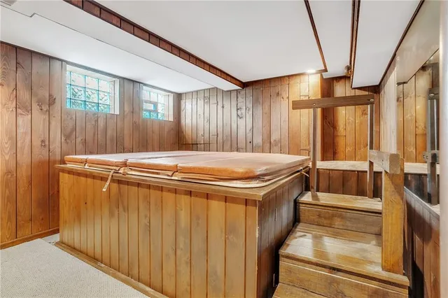 a view of a door and wooden floor