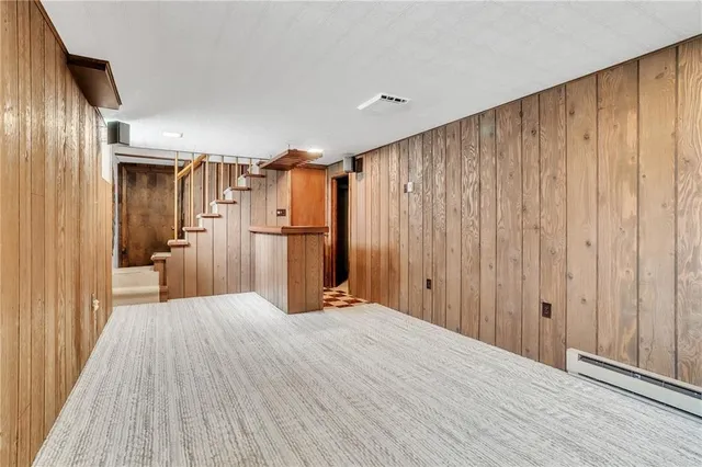 a view of a livingroom with wooden floor