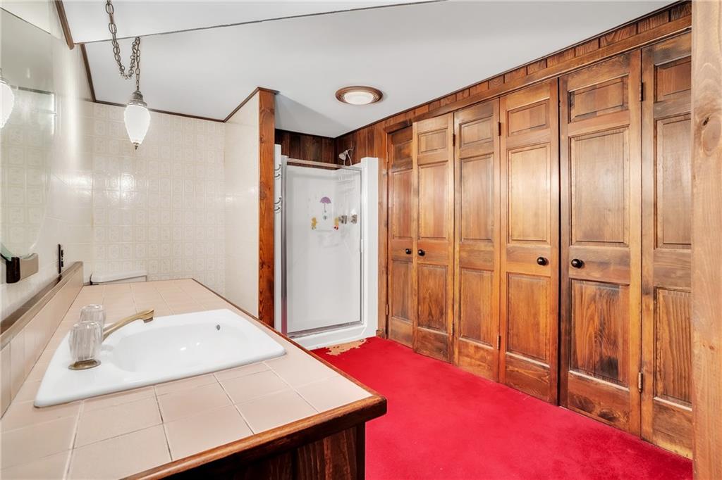 710 Walnut Street Monongahela, PA 15063 - Photo 25 of 46 a bathroom with a sink and a mirror