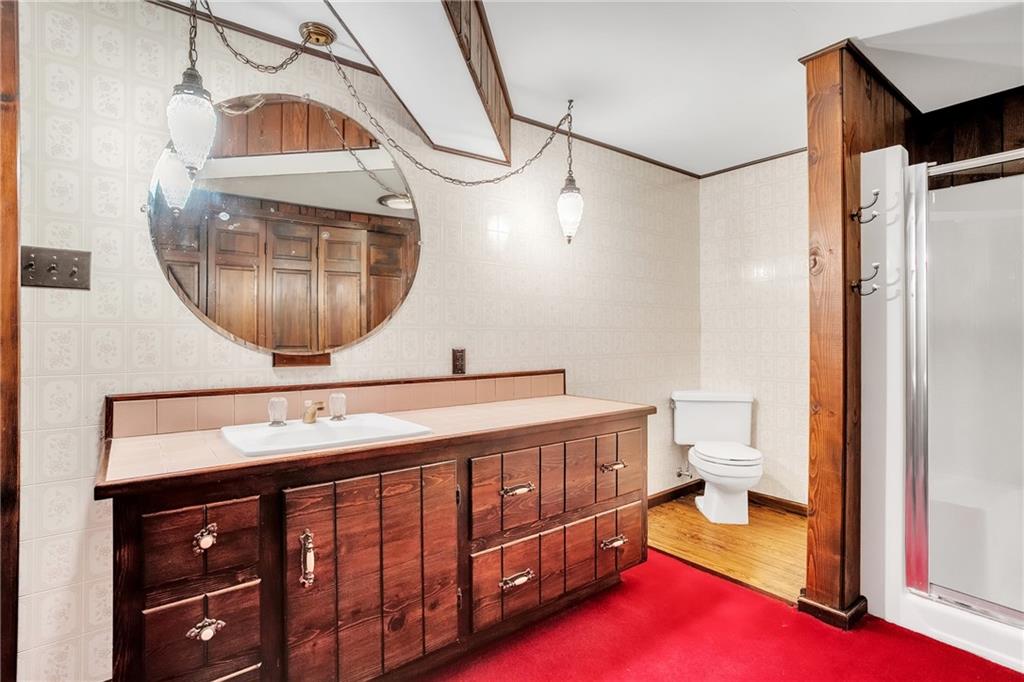 710 Walnut Street Monongahela, PA 15063 - Photo 26 of 46 a bathroom with a sink a toilet and a mirror