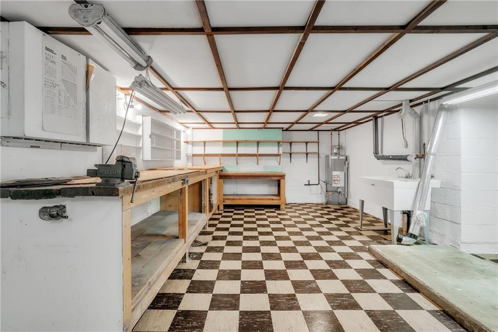 710 Walnut Street Monongahela, PA 15063 - Photo 29 of 46 a kitchen with a sink a stove a refrigerator and a window