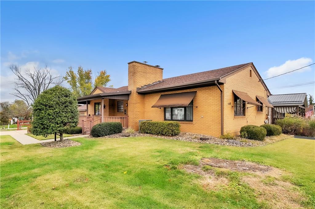 710 Walnut Street Monongahela, PA 15063 - Photo 35 of 46 a front view of a house with a yard