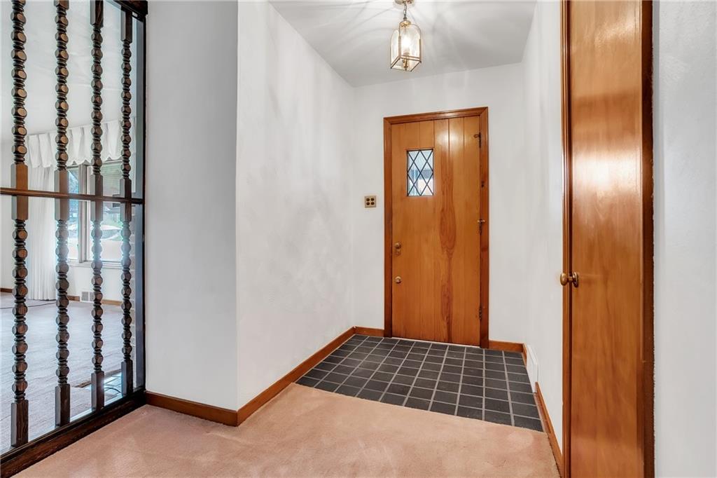 710 Walnut Street Monongahela, PA 15063 - Photo 5 of 46 a bedroom with a bed and wooden floor