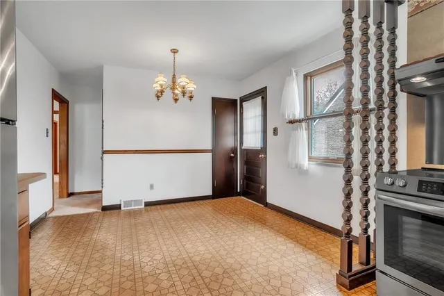 a view of a livingroom with a staircase