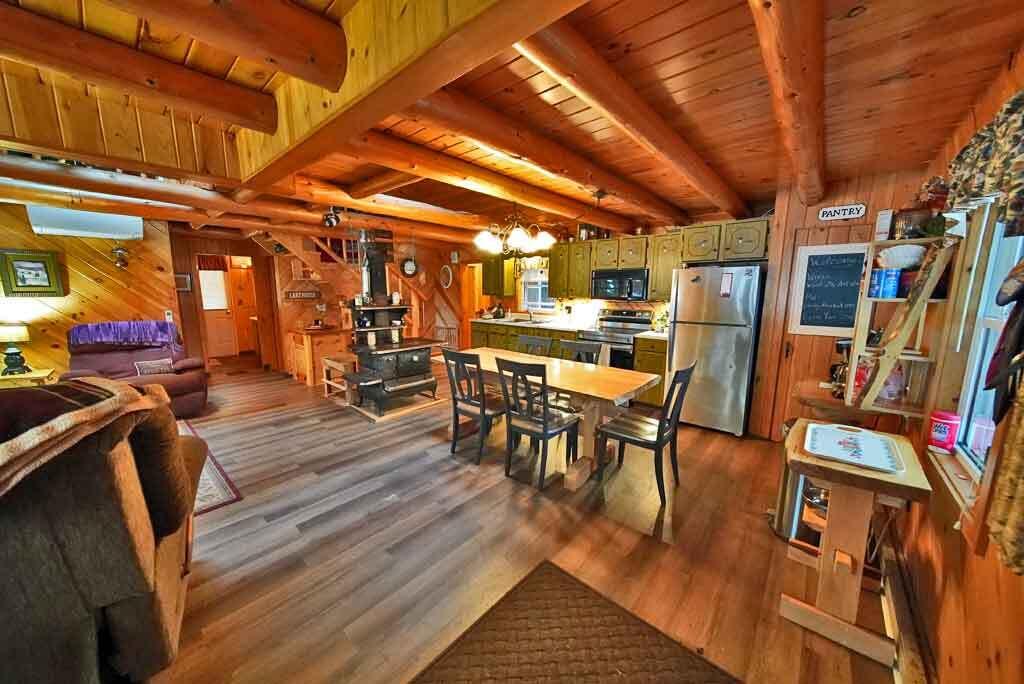 638 Sandy Beach Road Danforth, ME 04424 - Photo 9 of 94 wide-open-living-area