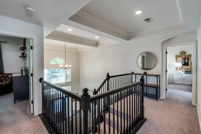 a view of a livingroom with furniture and hardwood floor