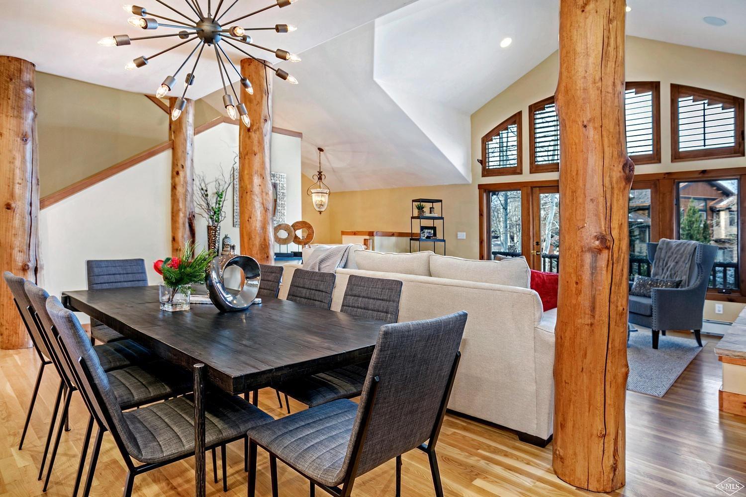 94 Knudson Ranch Road Edwards, CO 81632 - Photo 3 of 25 a view of a dining room with furniture and wooden floor